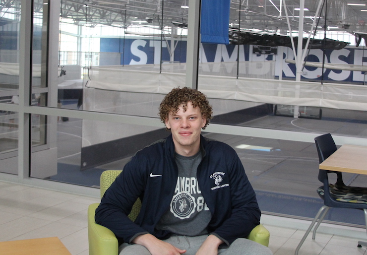 Brett sits in the student lounge in the SAU wellness and recreation center